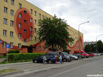 Zatoka parkingowa przy ulicy Olsztyńskiej 26.
